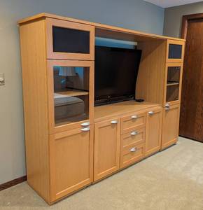 lot 31 image: Large Blonde Wood Entertainment Cabinet