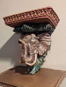 lot 54 image: Pair of Elephant Head Wall Shelves