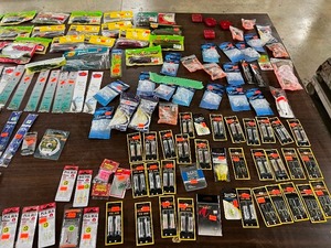 TABLE FULL OF FISHING LURES