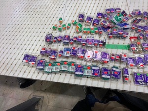 TABLE FULL OF PLASTIC WALL PLUGS, HOLLOW CORE PLUGS, CONCRETE WALL ANCHORS, & TOGGLE BOLTS