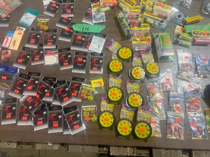 TABLE  FULL OF FISHING EQUIPMENT