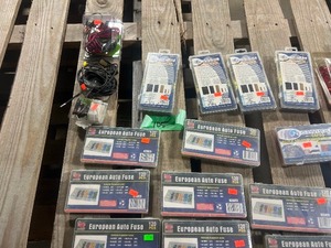 TABLE FULL OF FUSES, ELECTRICAL TAPE, & HEAT SHRINK