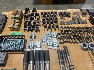 TABLE FULL OF TRAILER PARTS