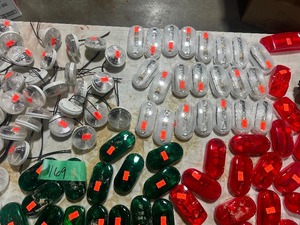 TABLE FULL OF TRAILER SIDE LIGHTS