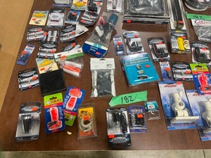 TABLE FULL OF BOATING ACCESORIES, LIGHTS, AND MISC
