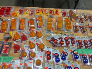 TABLE FULL OF TRAILER LIGHTS & SIDE MARKERS LIGHTS