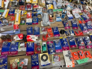 TABLE FULL OF MISC. PLUMBING PARTS