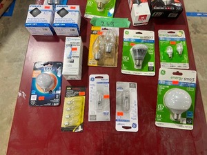 TABLE FULL OF MISC LED BULBS