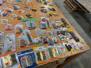 TABLE FULL OF SMALLER TYPE HINGES, S HOOKS, & EYELET HANGERS