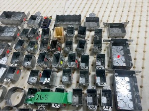 TABLE FULL OF ELECTRICAL SWITCH BOXES