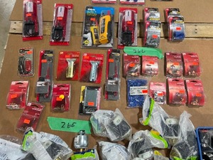 TABLE FULL OF 220 ELECTRICAL CORD ENDS (MALE), EXTENSION CORD ENDS (FEMALE), VOLTAGE TESTERS, WIRE NUTS, & ELECTRICAL TAPE