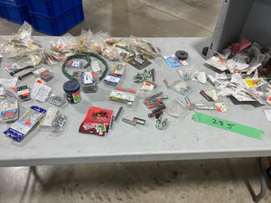TABLE FULL OF KEYWAY STOCK & MISC. ODDS AND ENDS