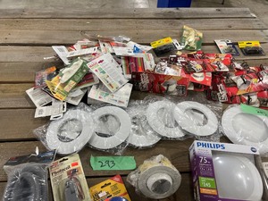 TABLE FULL OF KITCHEN HOOK STRIPS, T-REX DOUBLE FACE TAPE, & TRIM FOR RECESSED LIGHTING