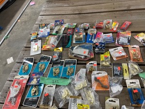 TABLE FULL OF WINDOW SASH LOCKS, OUTSIDE DOOR KNOB, & MISC ITEMS
