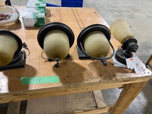 TABLE FULL OF DECORATIVE WALL LAMPS FOR INSIDE AND OUTDOOR USE