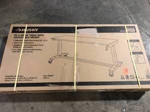 Husky 62 in. W x 24 in. D Adjustable Height Solid Wood Top Workbench Table in Black Customer Returns See Pictures