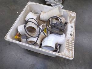 lot 45 image: Water Pump, PVC Fittings and Utility Sink no legs