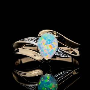 Three-Prong Pear Cabochon White Opal & Diamond Split Ribbon Curved Bypass Ring in Yellow Gold