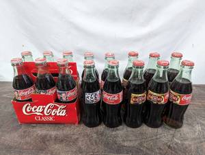 lot 70 image: Collection of Collectable Coca Cola Bottles