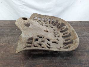 lot 8 image: Old Cast Iron Tractor Seat