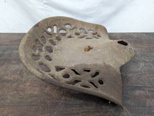 lot 9 image: Old Cast Iron Tractor Seat