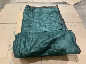 lot 521 image: Green Tarp 572 x 87