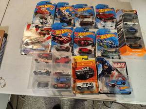 lot 13 image: Matchbox and Hot Wheels Cars Most New in Packaging