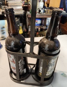 lot 39 image: Vintage Beer Bottle Carrier with Two Bottles of Surley Darkness