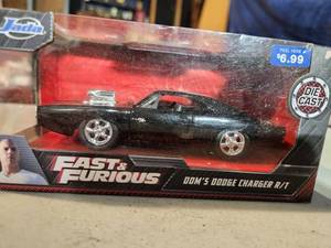 lot 69 image: Jada 124 Die Cast Metal Fast and Furious Doms Dodge Charger RT Car