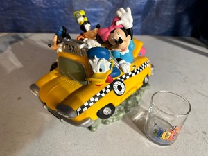 lot 100 image: Vintage Disney Mickey Mouse & Friends Taxi Cab Bank and 2001 Disney Shot Glass