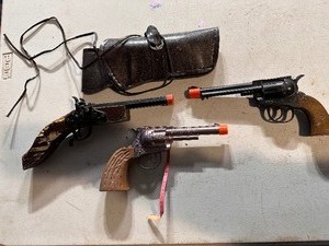 lot 62 image: Vintage Cap Guns - One in Leather Holster