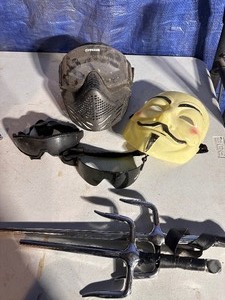lot 184 image: Movie V for Vendetta Mask, Tippmann Goggle System Facemask, Two Ninja Costume Sais, and Glasses