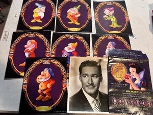 lot 312 image: 7 Walt Disney Enterprises Prints The Seven Dwarfs and Photo of  Errol Flynn.