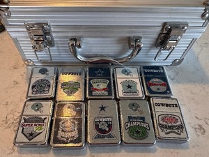 lot 172 image: Box filled with Dallas Cowboys Commemorative Championship Lighters