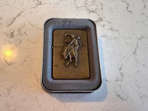 lot 223 image: Vintage 1994 Solid Brass Marlboro Man Cowboy Zippo Lighter