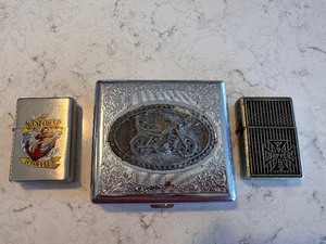 lot 235 image: Harley-Davidson Cigarette Case and Two West Coast Choppers Lighters