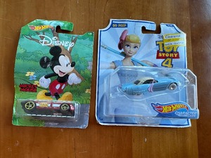 lot 278 image: Hot Wheels Disney Pixar Toy Story 4 Bo Peep Car and Mickey Mouse Car