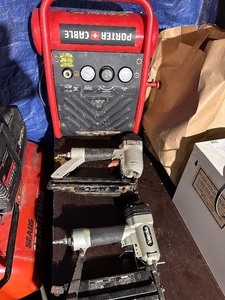 lot 164 image: Porter-Cable C1010 1-Gallon Quiet Trim Compressor and Two Finishing Nail Guns