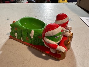 lot 106 image: Holiday M&M Ceramic Car Red and Green Candy Dish with M&Ms Dressed as Santa