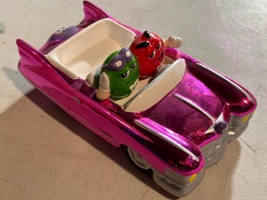 lot 105 image: Iridescent Pink Ceramic M&M Car