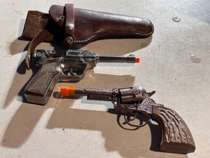 lot 63 image: Vintage Cap Guns - One in Leather Holster