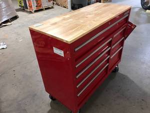 lot 1 image: Husky 42 in. W x 18.1 in. D 8-Drawer Red Mobile Workbench Cabinet with Solid Wood Top No Keys   Customer Returns See Pictures