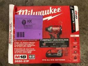 lot 7 image: Milwaukee M18 18-Volt Lithium-Ion Compact Brushless Cordless 14 in. Impact Driver Kit with One 2.0 Ah Battery, Charger & Tool Bag  Customer Returns See Pictures