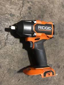 lot 16 image: RIDGID 15 Amp 10 in. Wet Tile Saw with Portable Stand Customer Returns See Pictures