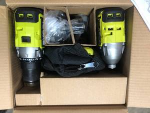 lot 19 image: RYOBI ONE HP 18V Brushless Cordless 12 in. DrillDriver and Impact Driver Kit w(2) 2.0 Ah Batteries, Charger, and Bag  Customer Returns See Pictures