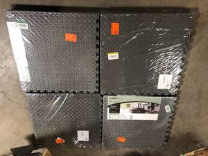 lot 49 image: Lot of 4 TrafficMaster Gray 24 in. W x 24 in. L x 0.5 in. Thick Foam ExerciseGym Flooring Tiles (6 TilesCase) (24 sq. ft.)  Customer Returns See Pictures
