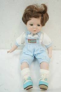 lot 91 image: Porcelain doll