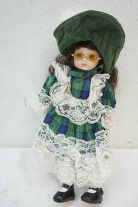 lot 96 image: Porcelain doll