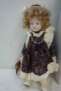 lot 171 image: Porcelain doll