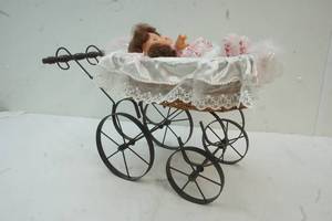 lot 287 image: Retro stroller with baby